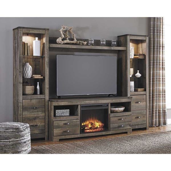 The Trinell Entertainment Wall with Fireplace Console by Ashley adds a rustic feel to your home w/the added warmth of a fireplace.